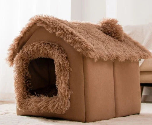 A cozy and comfortable pet bed with a self-warming fabric, durable non-slip base, and removable machine-washable cover