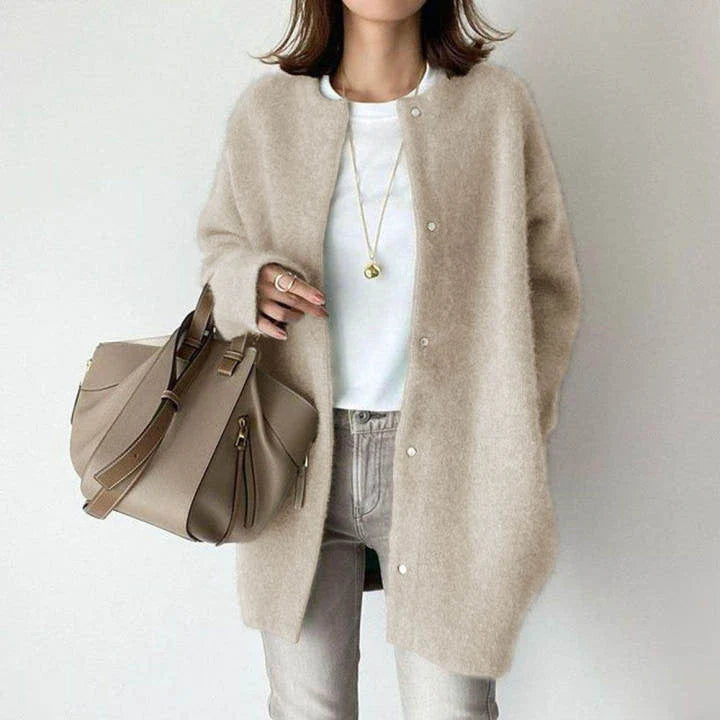 A cozy, knitted cardigan jacket in a variety of colors and sizes, featuring a relaxed open-front silhouette and premium construction for versatile layering.