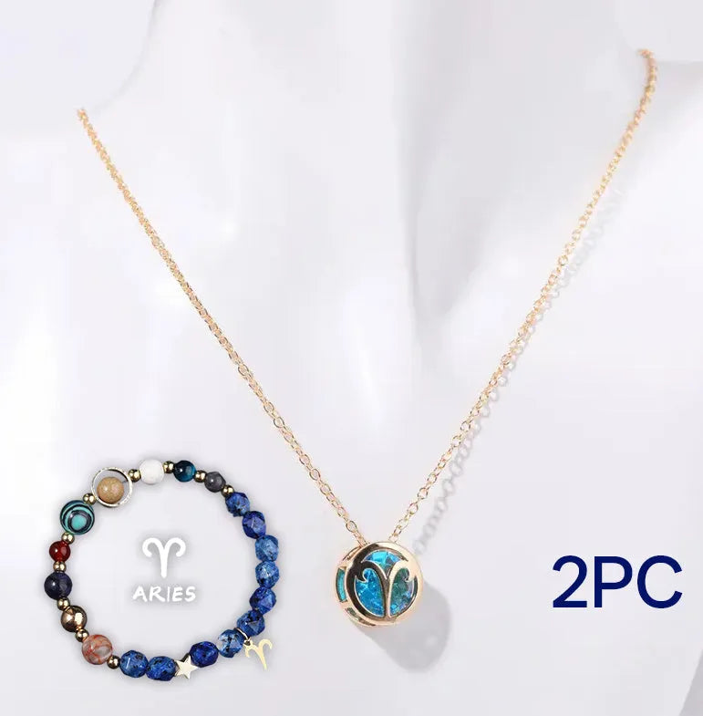A natural stone beaded necklace and matching adjustable bracelet laid flat.