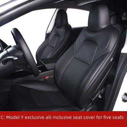 Black PVC seat cover installed on a Tesla Model 3 front seat, showing binding-style edges.