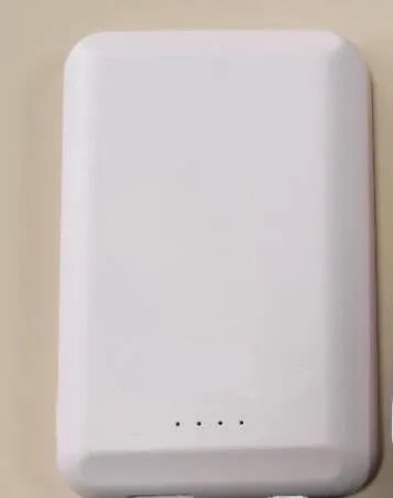 Magnetic wireless power bank showing five colour options with 5000mAh capacity and compact dimensions