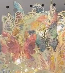 Handmade butterfly night lamp with glass shade on raw wood base, 12cm by 15cm.