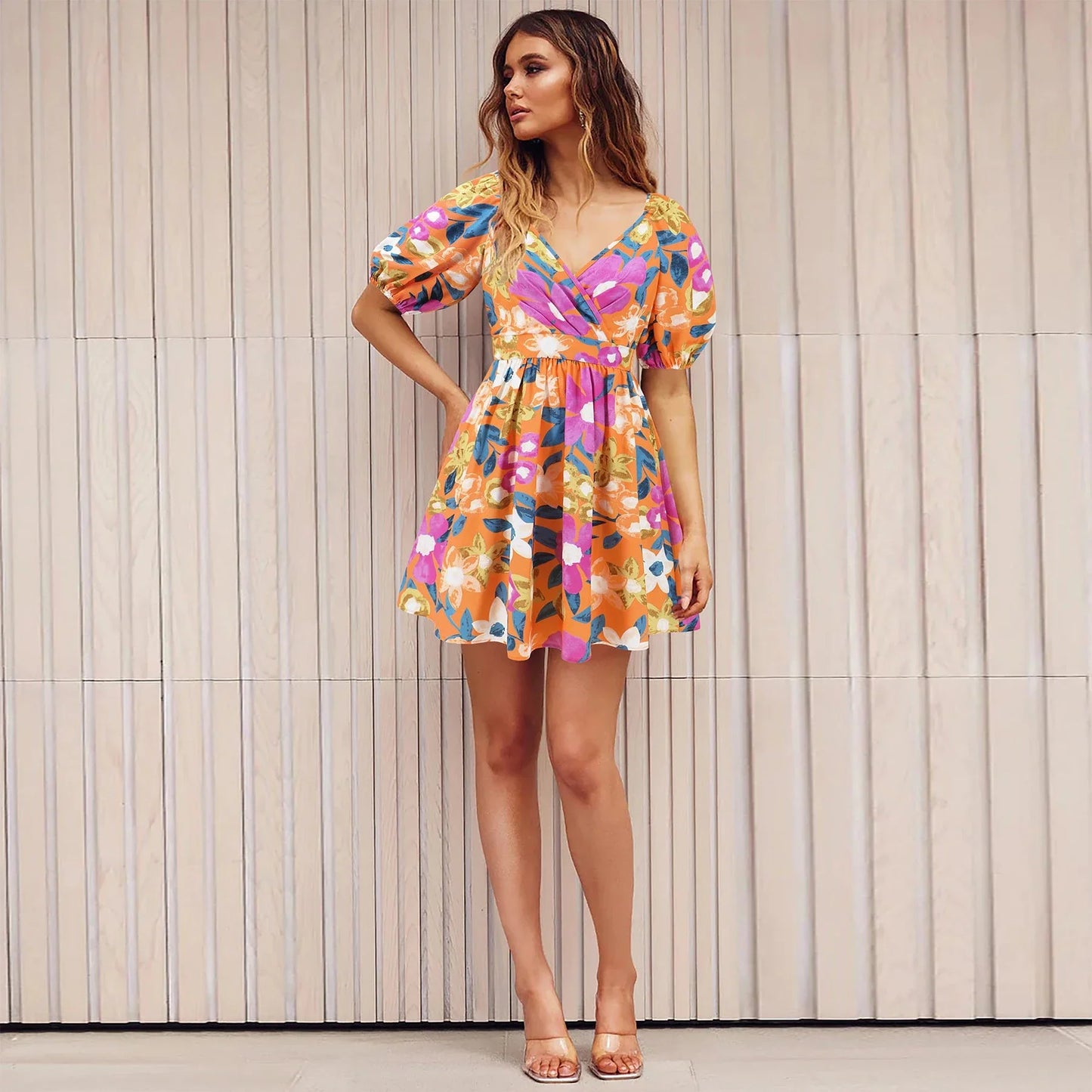 Floral lantern sleeve dress in various vibrant colors, perfect for summer vacations and beach activities