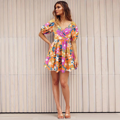 Floral lantern sleeve dress in various vibrant colors, perfect for summer vacations and beach activities