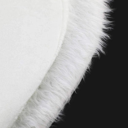 Luxurious plush white Christmas tree skirt with faux fur texture, perfect for holiday decor