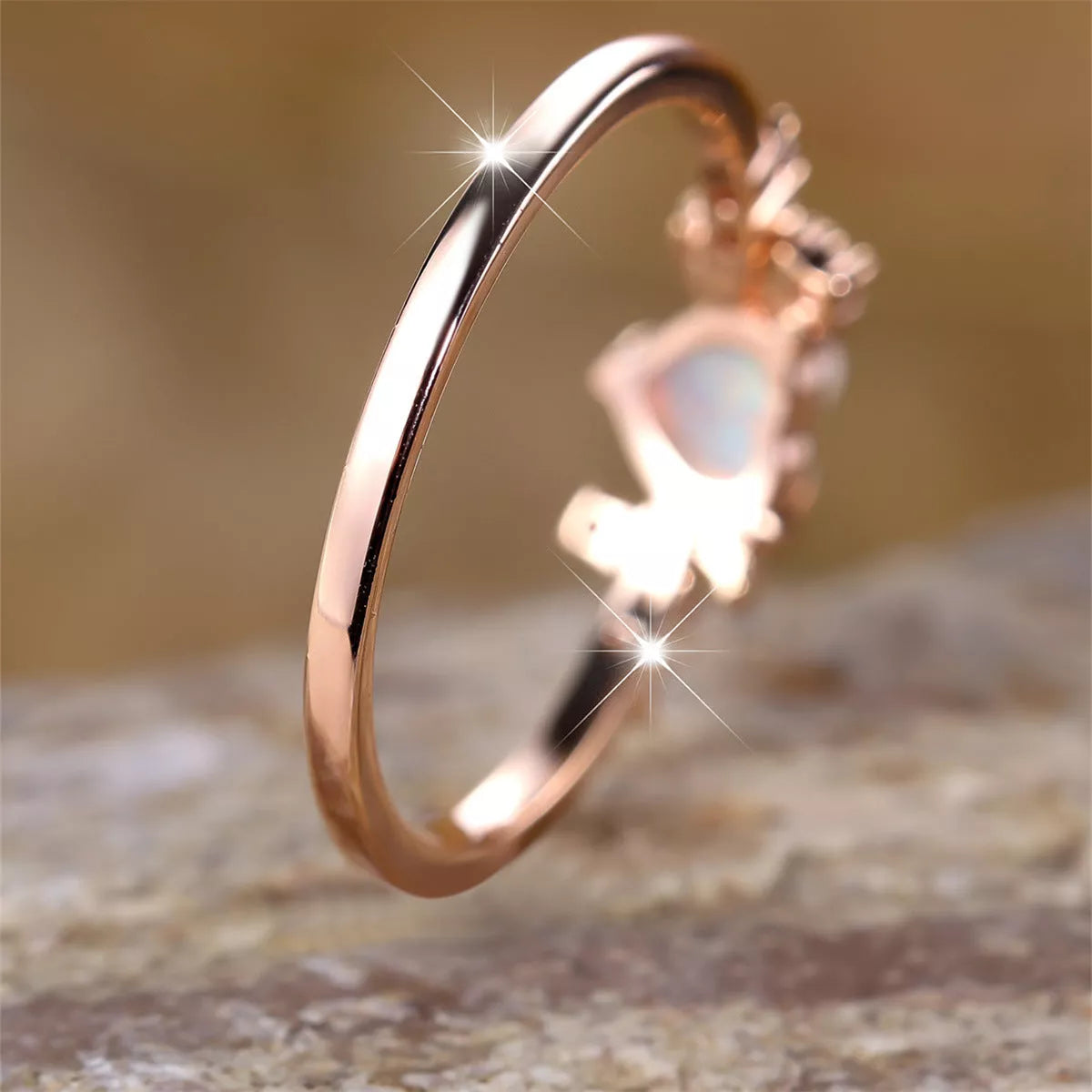 New Love Moon Three Claw Ring in platinum white opal and rose gold white opal