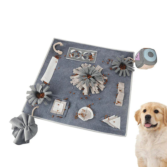 A grey snuffle pad with a soft, plush surface for hiding treats to stimulate a pet's natural foraging skills.