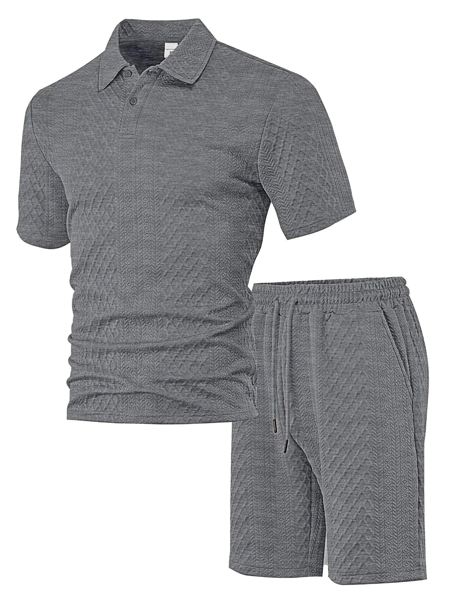 Men's patterned cloth casual suit set with short sleeve polo top and trousers on a hanger.