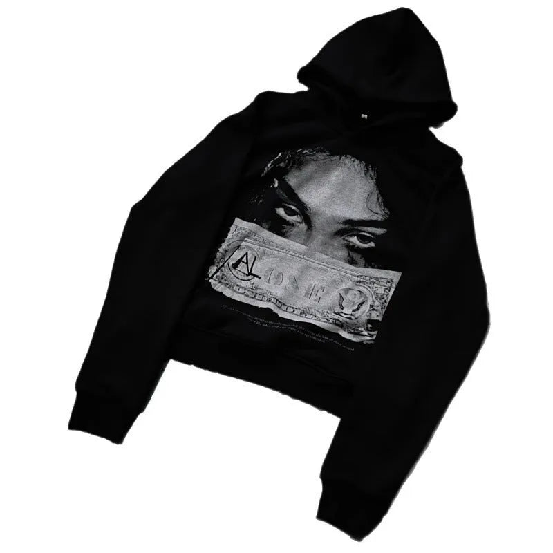 Black women's hoodie with cartoon print design in loose fit polyester construction