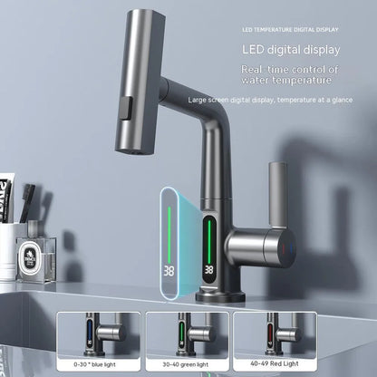 Modern digital display kitchen tap with pull-out spray hose showing LED temperature screen.