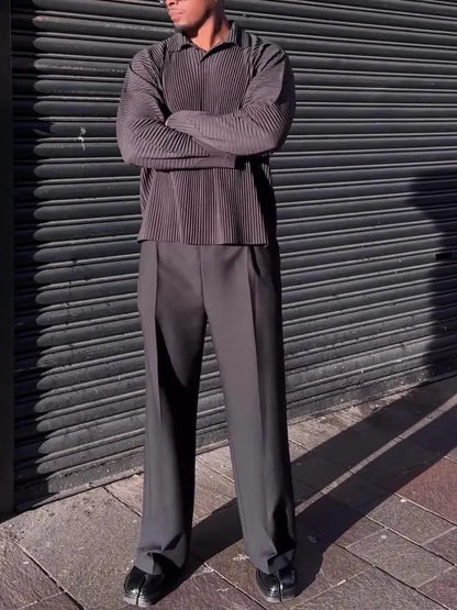 Man wearing a black pleated long-sleeve casual polyester top