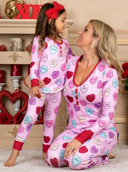 Cozy family matching Valentine's Day pajamas with heart-print design in cotton fabric