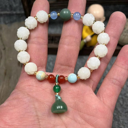 White Bodhi root bracelet with carved pumpkin lotus beads including Apple Orchard and Duobao styles