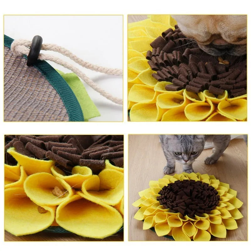 Yellow sunflower-shaped dog snuffle mat for slow feeding and nosework training on a floor.
