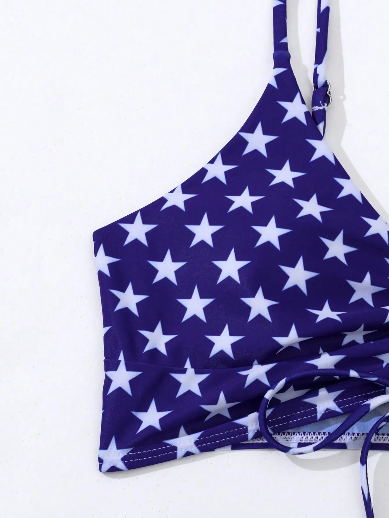 Women's blue and red Stars and Stripes high waist boxer swim shorts with a white drawstring.