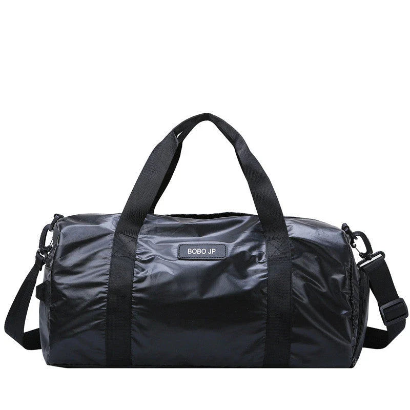 Premium durable fitness gym bag with separate compartments for shoes, laundry, and other gear, made of water-resistant materials for versatile use