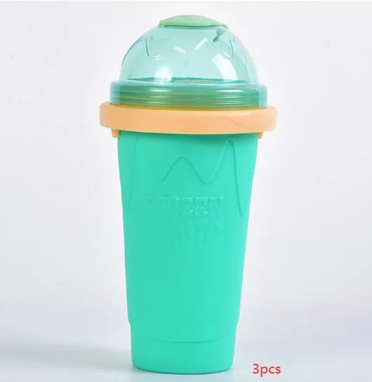 Silicone quick-freeze slush maker cup in mint green with lid and straw spoon