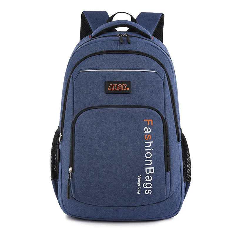 Black nylon street-style backpack with double shoulder straps, shown with open compartment revealing internal laptop sleeve and pockets.