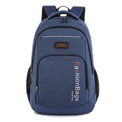Black nylon street-style backpack with double shoulder straps, shown with open compartment revealing internal laptop sleeve and pockets.
