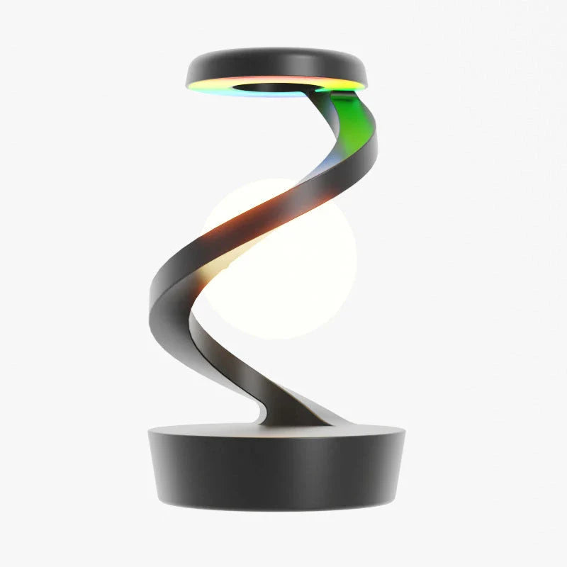 A rotating moon-shaped desk lamp with a wireless charging pad for smartphones, featuring a sleek and modern design.