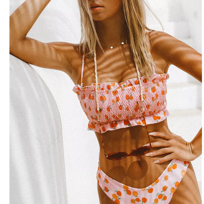 Women's high waist floral bikini in pink, perfect for swimming and beach activities