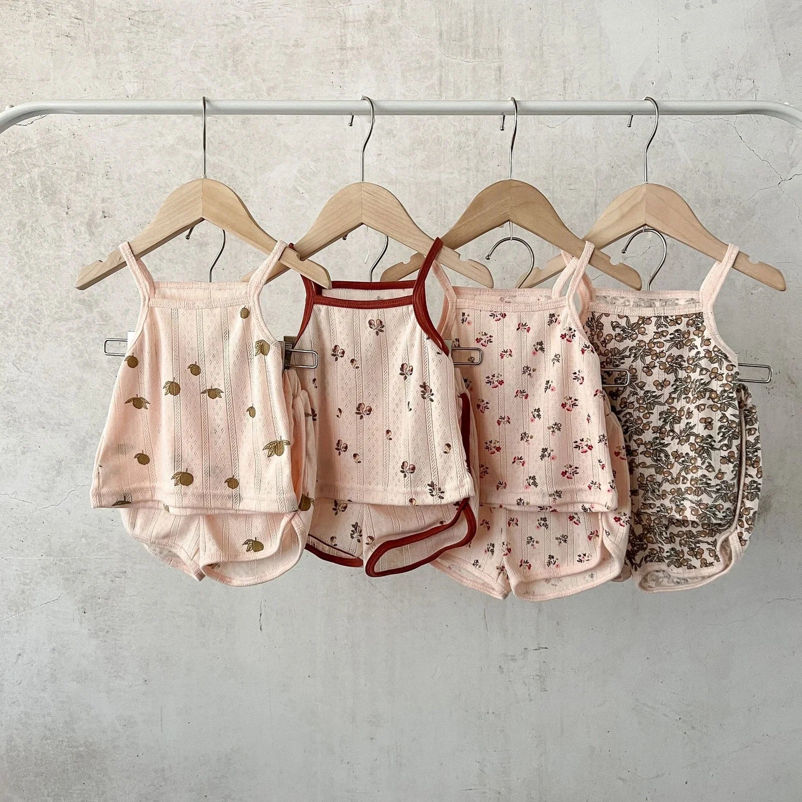 Children's cotton corduroy pajama set with cartoon print in olive, floral, lemon, or peach colours