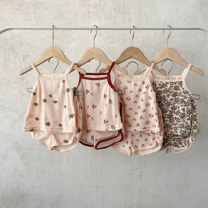 Children's cotton corduroy pajama set with cartoon print in olive, floral, lemon, or peach colours