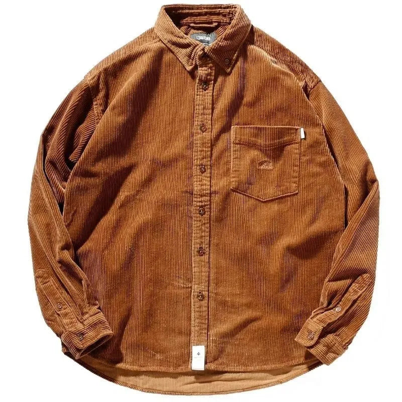 Long sleeve corduroy shirt in caramel colour with loose fit and cardigan style, suitable for casual wear.