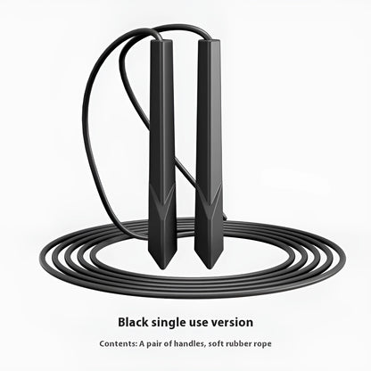 Blue PVC skipping rope with plastic handles on a grey background.