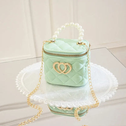 PVC bucket-style gel bag with a heart-shaped pattern, shown in apricot colour.