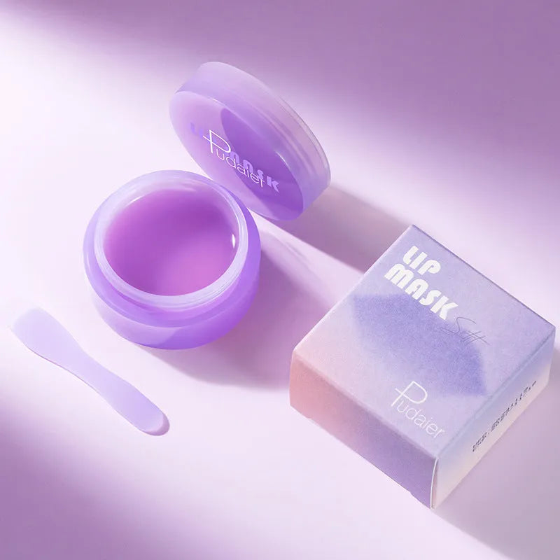 Box containing a 10ml lip exfoliating mask film and a plastic scraper tool for lip care.