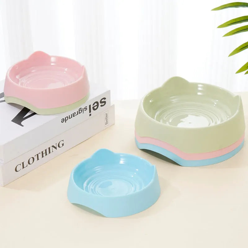 Blue ceramic dog slow feeder bowl with maze pattern and cups for puzzle feeding
