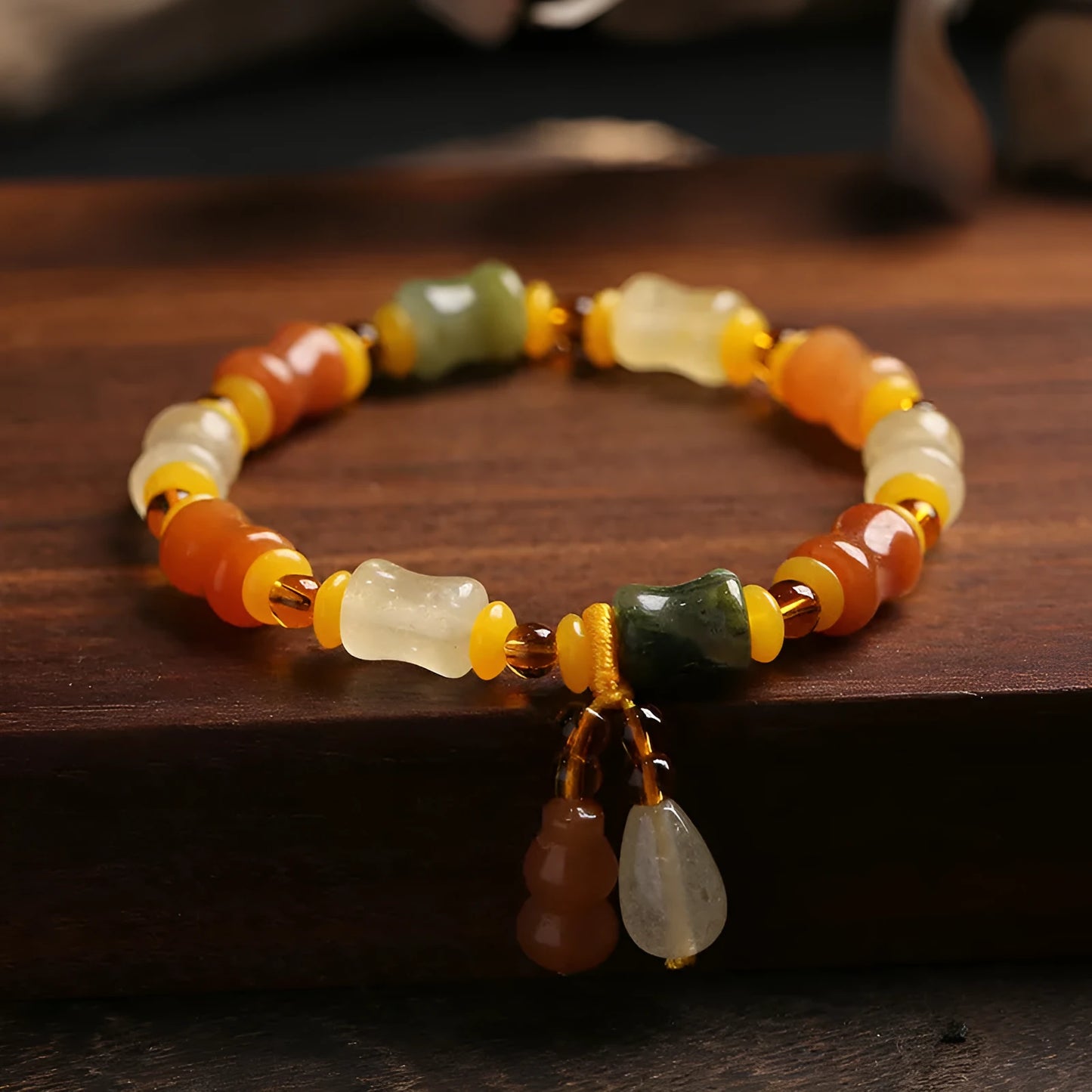 Natural Jinsi Jade small bone beads bracelet with geometric shape and Chinese auspicious patterns