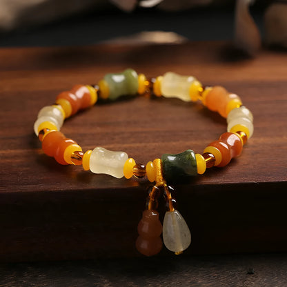 Natural Jinsi Jade small bone beads bracelet with geometric shape and Chinese auspicious patterns