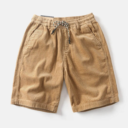 Men's khaki cargo shorts with multiple pockets on a straight-leg fit, shown on a hanger.