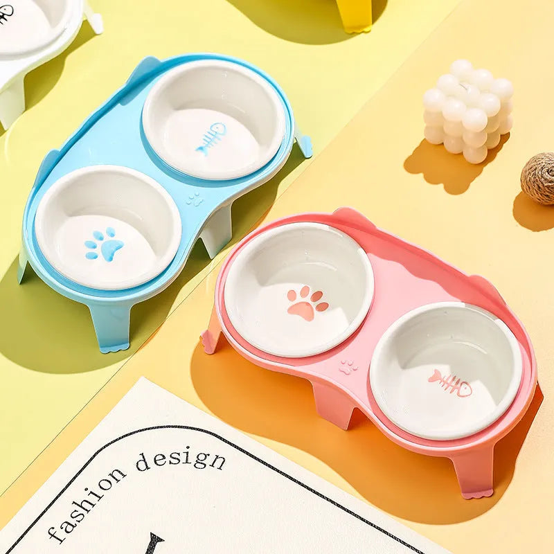 Ceramic cat bowl set with elevated stand in blue, pink, white, or yellow