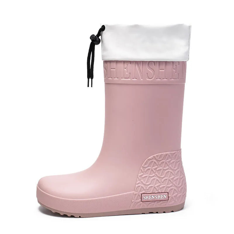 Women's solid colour PVC rain boots with non-slip soles in apricot, black, brown, or pink