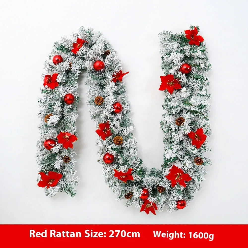 PVC Christmas rattan garland with flocked decoration in golden colour, draped as a festive vine.