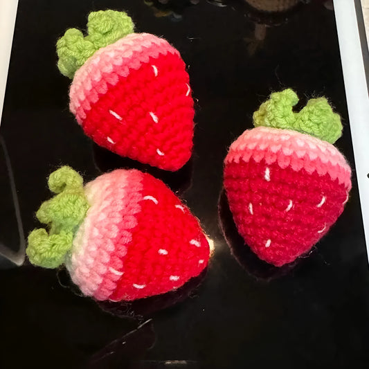 Red and pink plush strawberry pendant keychains with soft texture