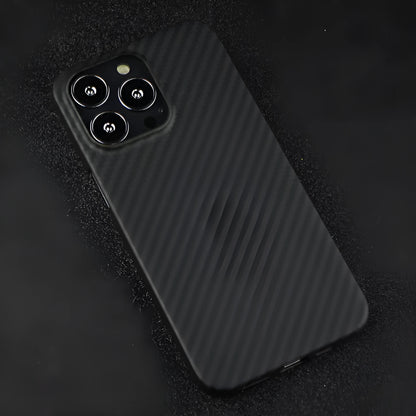 Dull black Kevlar fibre iPhone case with a stripe design on the back, shown on an iPhone model.