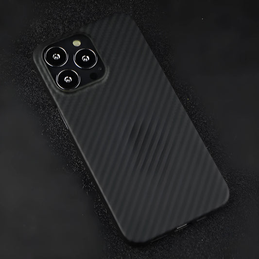 Dull black Kevlar fibre iPhone case with a stripe design on the back, shown on an iPhone model.