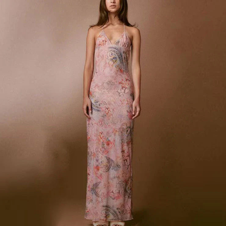 Chic floral halter dress with butterfly-inspired back, available in various vibrant colors and sizes