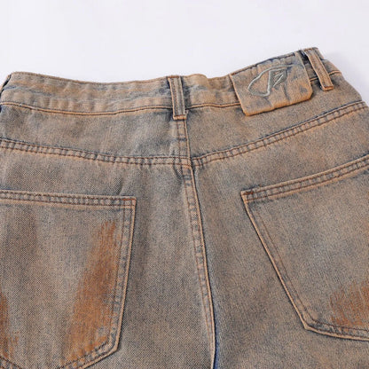 Men's vintage ripped jeans in washed blue cotton, loose straight-leg, mid waist, zipper fly, sizes S-XL.