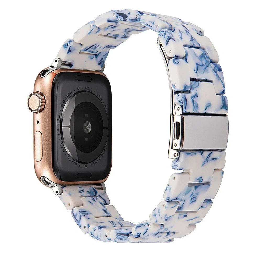 Slim resin Apple Watch strap showing attachment mechanism and colour options