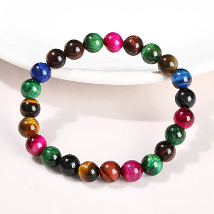 Colourful tiger eye gemstone bracelet with geometric round beads in assorted earthy tones.