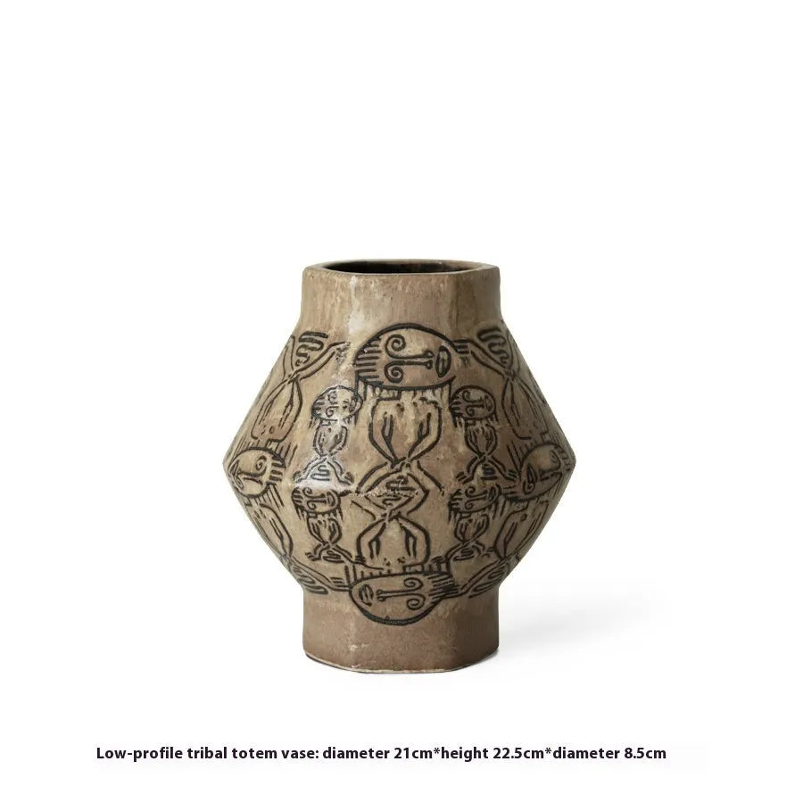 Hand-painted ceramic vase with religious patterns and carved texture in cylindrical shape