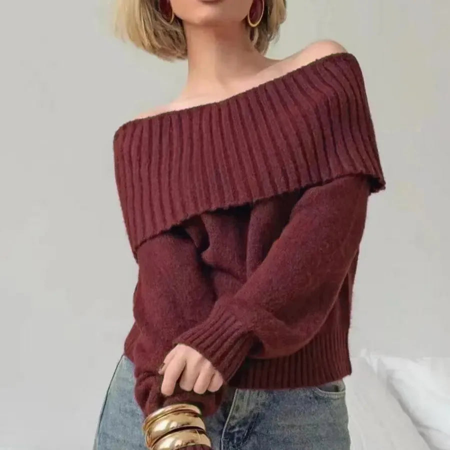 Grey off-shoulder acrylic sweater with 3D pattern texture, showing strapless design and regular sleeves