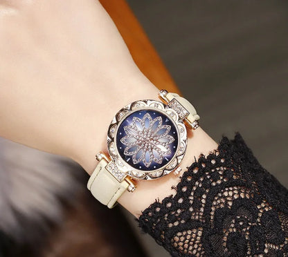 Diamond bezel women's fashion watch with round dial on wrist, showing colour options of red, purple, green, blue, black, pink, beige, grey, and brown.