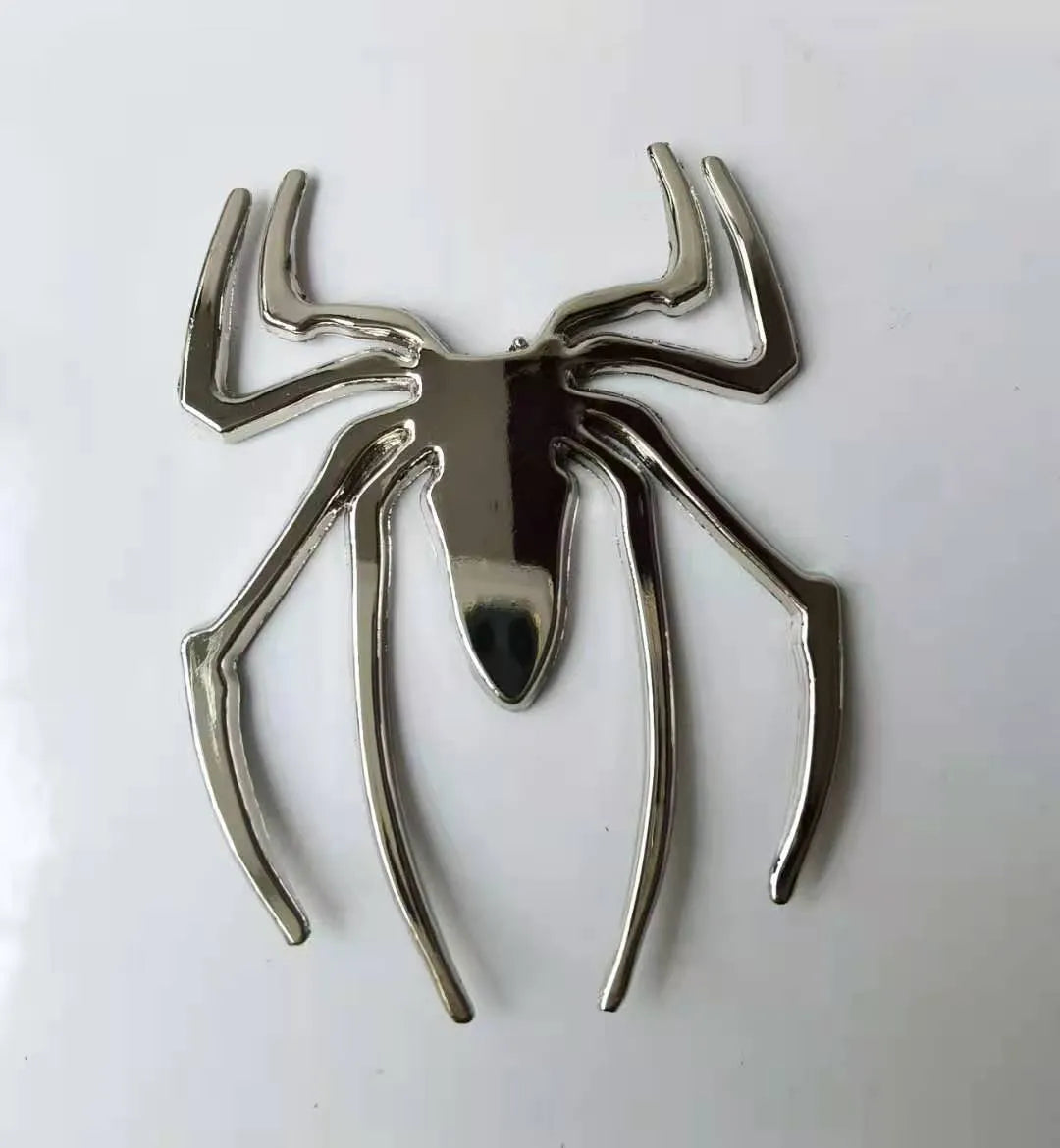 Three-dimensional metal spider bumper sticker in zinc alloy measuring 7cm by 5cm