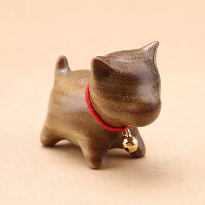 Handmade green sandalwood kitten ornament with unique design
